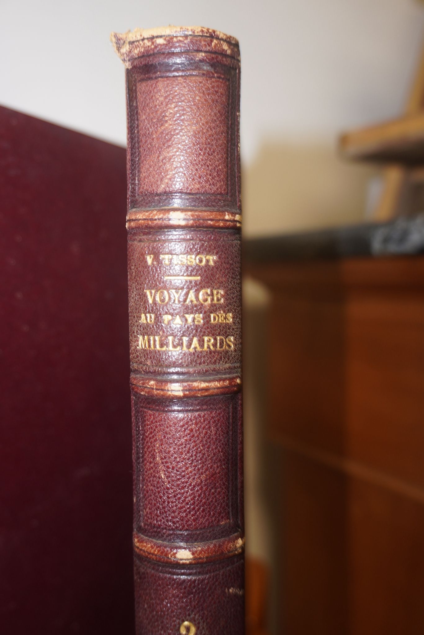 Ensemble ancien – Voyage au Pays des Milliards (1878) – Victor Tissot – 2 volumes reliés cuir